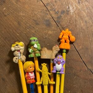 Classic 80s pencil toppers x 7. @ 1  1/2 -2 in
